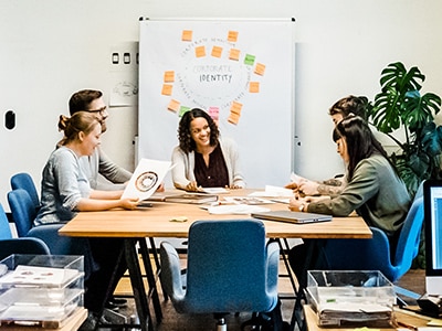 People around a table in a business setting