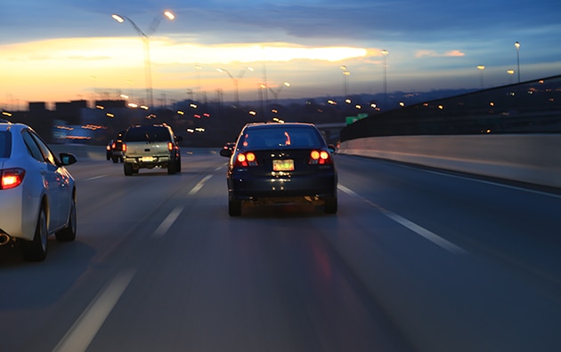 car driving down highway