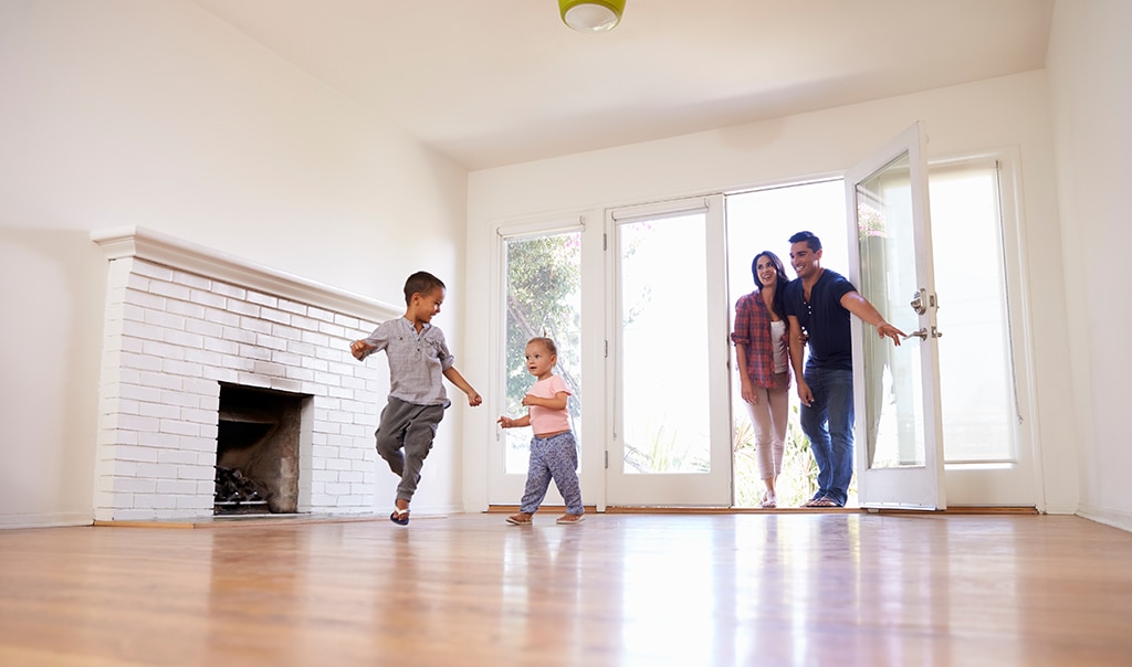 Family viewing an empty home