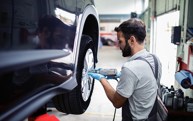 Mechanic changing a tire