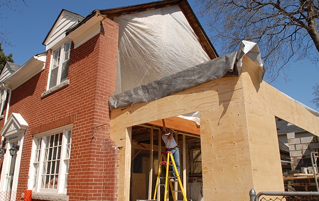 Adding a renovation on a red brick house